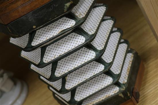 A 21-button Concertina Superior, possibly German, with fret-cut ends (faults, no case)